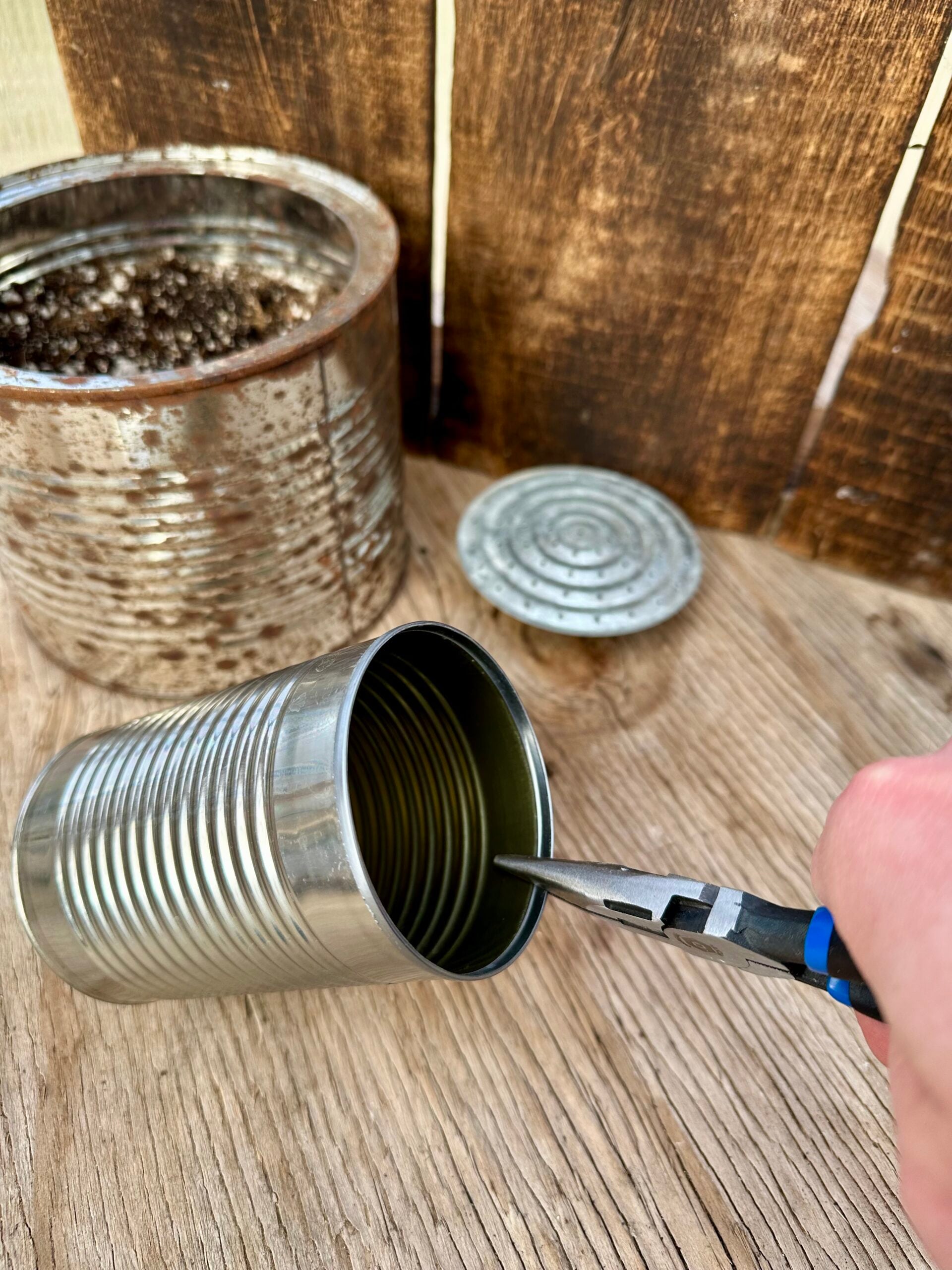 Crimping the edge of a tin can